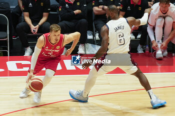 2024-07-22 - Andreas Obst of Germany and Lebron James of Usa during the International Friendly basketball match between USA and Germany on 22 July 2024 at O2 Arena in London, England - BASKETBALL - FRIENDLY GAME - USA V GERMANY - FRIENDLY MATCH - BASKETBALL