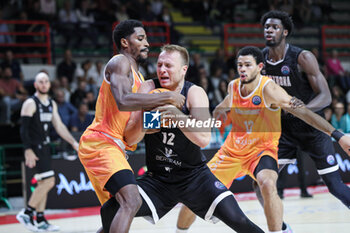 2024-10-02 - # 12 Arturs Strautins (Bertram Derthona Basket Tortona) and #13 Olivier Nkamhouna (Niners Chemnitz) - DERTHONA BASKET VS NINERS CHEMNITZ - CHAMPIONS LEAGUE - BASKETBALL