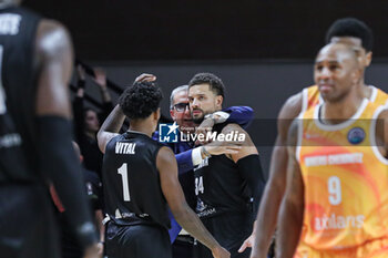 2024-10-02 - # 34 Kyle Weems (Bertram Derthona Basket Tortona) and De Raffaele Walter (head coach Bertram Derthona Basket Tortona) and #1 Vital Christian (Bertram Derthona Basket Tortona) - DERTHONA BASKET VS NINERS CHEMNITZ - CHAMPIONS LEAGUE - BASKETBALL