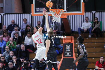 2024-11-13 - #32 Nicolas Carvacho (SL Benfica) and # 12 Arturs Strautins (Bertram Derthona Basket Tortona) - BETRAM DERTHONA VS SL BENFICA - CHAMPIONS LEAGUE - BASKETBALL