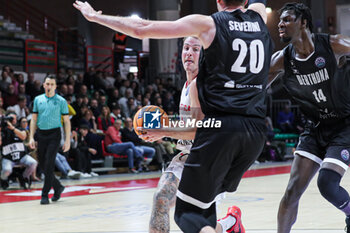 2024-11-13 - #9 Trey Drechsel (SL Benfica) and # 20 Luca Severini (Bertram Derthona Basket Tortona) - BETRAM DERTHONA VS SL BENFICA - CHAMPIONS LEAGUE - BASKETBALL