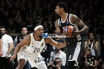 2024-03-15 - Jordan Mickey (Segafredo Virtus Bologna) (R) in action thwarted by Guerschon Yabusele (Real Madrid) during the Euroleague basketball championship match Segafredo Virtus Bologna Vs. Real Madrid. Bologna, March 15, 2024 at Segafredo Arena - VIRTUS SEGAFREDO BOLOGNA VS REAL MADRID - EUROLEAGUE - BASKETBALL