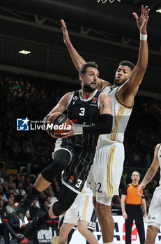 2024-03-15 - Marco Belinelli (Segafredo Virtus Bologna) in action thwarted by Walter Tavares (Real Madrid) during the Euroleague basketball championship match Segafredo Virtus Bologna Vs. Real Madrid. Bologna, March 15, 2024 at Segafredo Arena - VIRTUS SEGAFREDO BOLOGNA VS REAL MADRID - EUROLEAGUE - BASKETBALL