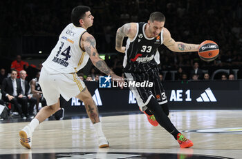 2024-03-15 - Achille Polonara (Segafredo Virtus Bologna) (R) in action thwarted by Gabriel Deck (Real Madrid) during the Euroleague basketball championship match Segafredo Virtus Bologna Vs. Real Madrid. Bologna, March 15, 2024 at Segafredo Arena - VIRTUS SEGAFREDO BOLOGNA VS REAL MADRID - EUROLEAGUE - BASKETBALL