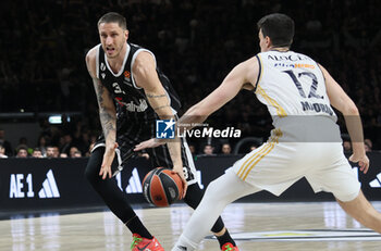2024-03-15 - Achille Polonara (Segafredo Virtus Bologna) (L) in action thwarted by Carlos Alocen (Real Madrid) during the Euroleague basketball championship match Segafredo Virtus Bologna Vs. Real Madrid. Bologna, March 15, 2024 at Segafredo Arena - VIRTUS SEGAFREDO BOLOGNA VS REAL MADRID - EUROLEAGUE - BASKETBALL