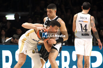 2024-03-15 - Carlos Alocen (Real Madrid) in action thwarted by Iffe Lundberg (Segafredo Virtus Bologna) during the Euroleague basketball championship match Segafredo Virtus Bologna Vs. Real Madrid. Bologna, March 15, 2024 at Segafredo Arena - VIRTUS SEGAFREDO BOLOGNA VS REAL MADRID - EUROLEAGUE - BASKETBALL