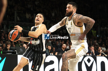 2024-03-15 - Iffe Lundberg (Segafredo Virtus Bologna) (L) in action thwarted by Vincent Poirier (Real Madrid) during the Euroleague basketball championship match Segafredo Virtus Bologna Vs. Real Madrid. Bologna, March 15, 2024 at Segafredo Arena - VIRTUS SEGAFREDO BOLOGNA VS REAL MADRID - EUROLEAGUE - BASKETBALL