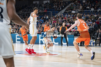 2024-01-11 - Facundo Campazzo of Real Madrid seen in action with the ball during the Euroleague basketball match between Real Madrid and Valencia at Wizink Center in Madrid, Spain. - REAL MADRID VS VALENCIA - EUROLEAGUE - BASKETBALL