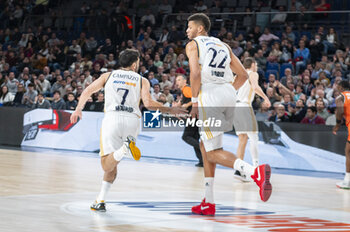 2024-01-11 - Facundo Campazzo (L) of Real Madrid seen greeting Edy Tavares (R) of Real Madrid during the Euroleague basketball match between Real Madrid and Valencia at Wizink Center in Madrid, Spain. - REAL MADRID VS VALENCIA - EUROLEAGUE - BASKETBALL