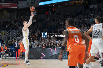 2024-01-11 - Dzanan Musa of Real Madrid seen shooting the ball during the Euroleague basketball match between Real Madrid and Valencia at Wizink Center in Madrid, Spain. - REAL MADRID VS VALENCIA - EUROLEAGUE - BASKETBALL