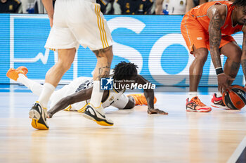2024-01-11 - Eli Ndiaye of Real Madrid seen on the floor during the Euroleague basketball match between Real Madrid and Valencia at Wizink Center in Madrid, Spain. - REAL MADRID VS VALENCIA - EUROLEAGUE - BASKETBALL