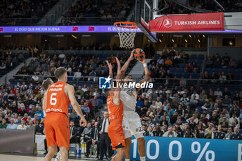 2024-01-11 - Edy Tavares of Real Madrid seen in action with the ball during the Euroleague basketball match between Real Madrid and Valencia at Wizink Center in Madrid, Spain. - REAL MADRID VS VALENCIA - EUROLEAGUE - BASKETBALL