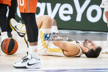 2024-01-11 - Facundo Campazzo of Real Madrid seen on the floor during the Euroleague basketball match between Real Madrid and Valencia at Wizink Center in Madrid, Spain. - REAL MADRID VS VALENCIA - EUROLEAGUE - BASKETBALL