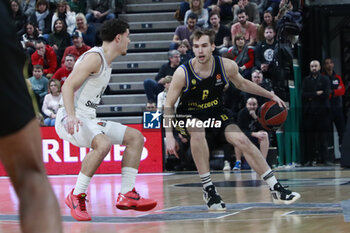 2024-01-12 - Malte DELOW of Alba Berlin and Noam YAACOV of Lyon during the Turkish Airlines EuroLeague basketball match between LDLC ASVEL Villeurbanne and Alba Berlin on January 12, 2024 at Astroballe in Villeurbanne, France - BASKETBALL - EUROLEAGUE - ASVEL V ALBA BERLIN - EUROLEAGUE - BASKETBALL