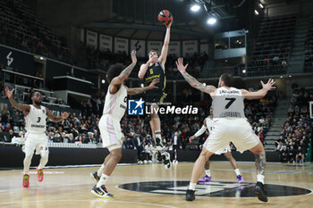 2024-01-12 - Malte DELOW of Alba Berlin and Mike SCOTT of Lyon and Joffrey LAUVERGNE of Lyon during the Turkish Airlines EuroLeague basketball match between LDLC ASVEL Villeurbanne and Alba Berlin on January 12, 2024 at Astroballe in Villeurbanne, France - BASKETBALL - EUROLEAGUE - ASVEL V ALBA BERLIN - EUROLEAGUE - BASKETBALL