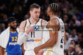 2024-01-30 - Mario Hezonja and Guerschon Yabusele of Real Madrid talking during the Turkish Airlines EuroLeague basketball match between Real Madrid and Maccabi Playtika Tel Aviv on January 30, 2024 at Wizink Center in Madrid, Spain - BASKETBALL - EUROLEAGUE - REAL MADRID V MACCABI TEL AVIV - EUROLEAGUE - BASKETBALL