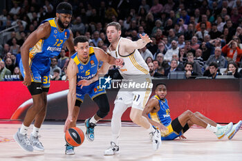 2024-01-30 - Josh Nebo and Wade Baldwin IV of Maccabi Tel Aviv and Fabien Causer of Real Madrid during the Turkish Airlines EuroLeague basketball match between Real Madrid and Maccabi Playtika Tel Aviv on January 30, 2024 at Wizink Center in Madrid, Spain - BASKETBALL - EUROLEAGUE - REAL MADRID V MACCABI TEL AVIV - EUROLEAGUE - BASKETBALL
