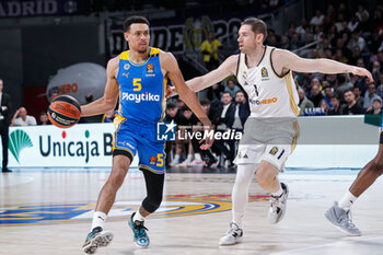 2024-01-30 - Wade Baldwin IV of Maccabi Tel Aviv and Fabien Causer of Real Madrid during the Turkish Airlines EuroLeague basketball match between Real Madrid and Maccabi Playtika Tel Aviv on January 30, 2024 at Wizink Center in Madrid, Spain - BASKETBALL - EUROLEAGUE - REAL MADRID V MACCABI TEL AVIV - EUROLEAGUE - BASKETBALL