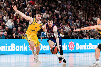 2024-02-09 - Dario Brizuela of Fc Barcelona in action against Jonas Mattisseck of Alba Berlin during the Turkish Airlines EuroLeague basketball match between FC Barcelona and Alba Berlin on February 9, 2024 at Palau Blaugrana in Barcelona, Spain - BASKETBALL - EUROLEAGUE - FC BARCELONA V ALBA BERLIN - EUROLEAGUE - BASKETBALL