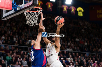 2024-03-01 - Elie Okobo of AS Monaco in action against Jabari Parker of Fc Barcelona during the Turkish Airlines EuroLeague basketball match between FC Barcelona and AS Monaco on March 1, 2024 at Palau Blaugrana in Barcelona, Spain - BASKETBALL - EUROLEAGUE - FC BARCELONA V MONACO - EUROLEAGUE - BASKETBALL