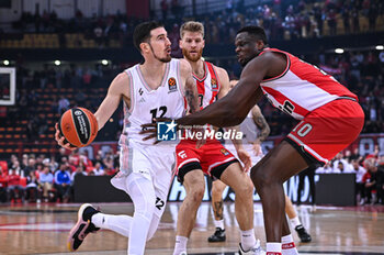 2024-03-21 - 12 Nando De Colo of LDLC ASVEL Villeurbanne competing with 10 Moustapha Fall of Olympiacos Piraeus during the Euroleague, Round 31, match between Olympiacos Piraeus and LDLC ASVEL Villeurbanne at Peace & Friendship Stadium on March 21, 2024, in Piraeus, Greece. - OLYMPIACOS PIRAEUS VS LDLC ASVEL VILLEURBANNE - EUROLEAGUE - BASKETBALL