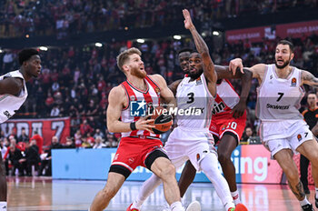 2024-03-21 - 0 Thomas Walkup of Olympiacos Piraeus is playing during the Euroleague, Round 31, match between Olympiacos Piraeus and LDLC ASVEL Villeurbanne at Peace & Friendship Stadium on March 21, 2024, in Piraeus, Greece. - OLYMPIACOS PIRAEUS VS LDLC ASVEL VILLEURBANNE - EUROLEAGUE - BASKETBALL