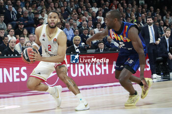 2024-03-28 - Elie OKOBO of Monaco and Charles KAHUDI of Lyon during the Turkish Airlines EuroLeague basketball match between LDLC ASVEL Villeurbanne and AS Monaco on March 28, 2024 at LDLC Arena in Decines-Charpieu, France - BASKETBALL - EUROLEAGUE - ASVEL V MONACO - EUROLEAGUE - BASKETBALL