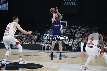 2024-03-28 - Joffrey LAUVERGNE of Lyon and Donatas MOTIEJUNAS of Monaco and Jordan LOYD of Monaco during the Turkish Airlines EuroLeague basketball match between LDLC ASVEL Villeurbanne and AS Monaco on March 28, 2024 at LDLC Arena in Decines-Charpieu, France - BASKETBALL - EUROLEAGUE - ASVEL V MONACO - EUROLEAGUE - BASKETBALL
