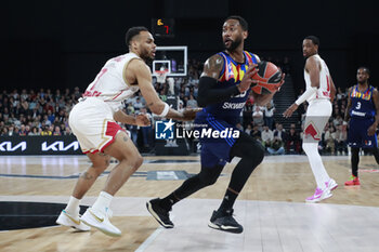 2024-03-28 - David LIGHTY of Lyon and Elie OKOBO of Monaco during the Turkish Airlines EuroLeague basketball match between LDLC ASVEL Villeurbanne and AS Monaco on March 28, 2024 at LDLC Arena in Decines-Charpieu, France - BASKETBALL - EUROLEAGUE - ASVEL V MONACO - EUROLEAGUE - BASKETBALL