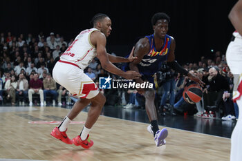 2024-03-28 - Mbaye NDIAYE of Lyon and Jaron BLOSSOMGAME of Monaco during the Turkish Airlines EuroLeague basketball match between LDLC ASVEL Villeurbanne and AS Monaco on March 28, 2024 at LDLC Arena in Decines-Charpieu, France - BASKETBALL - EUROLEAGUE - ASVEL V MONACO - EUROLEAGUE - BASKETBALL