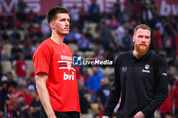 2024-04-12 - 30 Filip Petrusev with 17 Ignas Brazdeikis of Olympiacos Piraeus at bench during the Euroleague, Round 34, match between Olympiacos Piraeus and Fenerbahce Beko Istanbul at Peace & Friendship Stadium on April 12, 2024, in Piraeus, Greece. - OLYMPIACOS PIRAEUS VS FENERBAHCE BEKO ISTANBUL - EUROLEAGUE - BASKETBALL