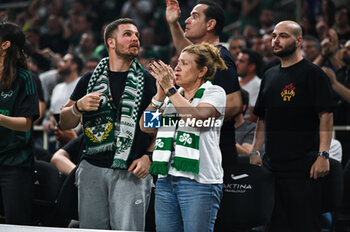 2024-05-07 - Panathinaikos Athens supporters are having fun during the Euroleague, Playoff D, Game 5, match between Panathinaikos Athens and Maccabi Playtika Tel Aviv at Oaka Altion on May 7, 2024, in Athens, Greece. - PANATHINAIKOS AKTOR ATHENS VS MACCABI TEL AVIV, PLAYOFFS D, GAME 5 - EUROLEAGUE - BASKETBALL