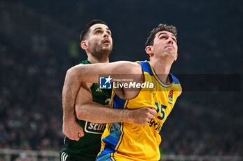2024-05-07 - 15 Jake Cohen of Maccabi Playtika Tel Aviv competing with 21 Ioannis Papapetrou of Panathinaikos Athens during the Euroleague, Playoff D, Game 5, match between Panathinaikos Athens and Maccabi Playtika Tel Aviv at Oaka Altion on May 7, 2024, in Athens, Greece. - PANATHINAIKOS AKTOR ATHENS VS MACCABI TEL AVIV, PLAYOFFS D, GAME 5 - EUROLEAGUE - BASKETBALL
