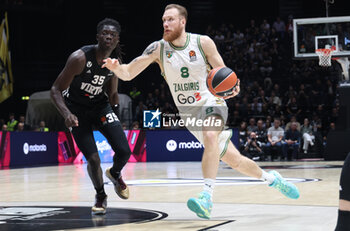 2024-10-15 - Ignas Brazdeikis (Zalgiris) Ignas Brazdeikis (Zalgiris) in action thwarted by Momo Diouf (Virtus Bologna) during the basketball Turkish Airlines Euroleague match between Virtus Segafredo Bologna and Zalgiris Kaunas at the Unipol Arena, Casalecchio (Bologna), Italy, October 15, 2024 - photo: Michele Nucci - SEGAFREDO VIRTUS BOLOGNA VS ZALGIRIS KAUNAS - EUROLEAGUE - BASKETBALL