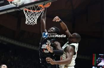 2024-10-15 - Momo Diouf (Virtus Bologna) in action thwarted by Bryant Dunston (Zalgiris) Momo Diouf (Virtus Bologna) in action thwarted by Bryant Dunston (Zalgiris) during the basketball Turkish Airlines Euroleague match between Virtus Segafredo Bologna and Zalgiris Kaunas at the Unipol Arena, Casalecchio (Bologna), Italy, October 15, 2024 - photo: Michele Nucci - SEGAFREDO VIRTUS BOLOGNA VS ZALGIRIS KAUNAS - EUROLEAGUE - BASKETBALL