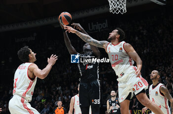 2024-10-29 - Momo Diouf (Virtus Bologna) in action thwarted by Elias Harris (Bayern) during the basketball Turkish Airlines Euroleague match between Virtus Segafredo Bologna and Bayern Monaco at the Unipol Arena, Casalecchio (Bologna), Italy, October 29, 2024 - photo: Michele Nucci - SEGAFREDO VIRTUS BOLOGNA VS BAYERN MUNICH - EUROLEAGUE - BASKETBALL