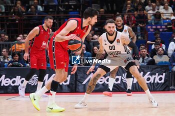 2024-10-31 - Leandro Bolmaro (EA7 Emporio Armani Olimpia Milano) thwarted by Isaia Cordinier (Virtus Segafredo Bologna) - EA7 EMPORIO ARMANI MILANO VS SEGAFREDO VIRTUS BOLOGNA - EUROLEAGUE - BASKETBALL