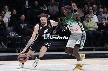 2024-11-15 - Isaia Cordinier (Virtus Bologna) (L) in action thwarted by Kendrick Nunn (Athens) during the basketball Turkish Airlines Euroleague match between Virtus Segafredo Bologna and Panathinaikos Aktor Athens at the Unipol Arena, Casalecchio (Bologna), Italy, November 15, 2024 - photo: Michele Nucci - SEGAFREDO VIRTUS BOLOGNA VS PANATHINAIKOS AKTOR ATHENS - EUROLEAGUE - BASKETBALL