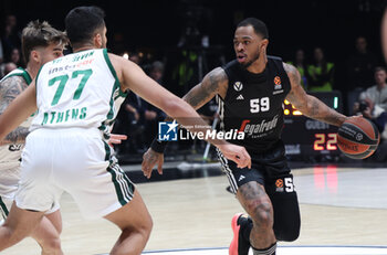 2024-11-15 - Rayjon Tucker (Virtus Bologna) in action thwarted by Omer Yurtseven (Athens) during the basketball Turkish Airlines Euroleague match between Virtus Segafredo Bologna and Panathinaikos Aktor Athens at the Unipol Arena, Casalecchio (Bologna), Italy, November 15, 2024 - photo: Michele Nucci - SEGAFREDO VIRTUS BOLOGNA VS PANATHINAIKOS AKTOR ATHENS - EUROLEAGUE - BASKETBALL