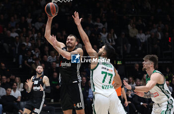 2024-11-15 - Ante Zizic (Virtus Bologna) in action thwarted by Konstantinos Mitoglou (Athens) during the basketball Turkish Airlines Euroleague match between Virtus Segafredo Bologna and Panathinaikos Aktor Athens at the Unipol Arena, Casalecchio (Bologna), Italy, November 15, 2024 - photo: Michele Nucci - SEGAFREDO VIRTUS BOLOGNA VS PANATHINAIKOS AKTOR ATHENS - EUROLEAGUE - BASKETBALL