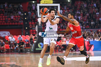 2024-10-15 - 10 Leandro Bolmaro of EA7 Emporio Armani Milan competing with 22 Tyler Dorsey of Olympiacos Piraeus during the Euroleague, Round 3 match between Olympiacos Piraeus and EA7 Emporio Armani Milan at Peace and Friendship Stadium on October 15, 2024, Piraeus, Greece. - OLYMPIACOS VS EA7 EMPORIO ARMANI MILAN - EUROLEAGUE - BASKETBALL