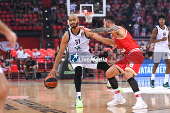 2024-10-15 - 31 Shavon Shields of EA7 Emporio Armani Milan competing with 8 Luca Vildoza of Olympiacos Piraeus during the Euroleague, Round 3 match between Olympiacos Piraeus and EA7 Emporio Armani Milan at Peace and Friendship Stadium on October 15, 2024, Piraeus, Greece. - OLYMPIACOS VS EA7 EMPORIO ARMANI MILAN - EUROLEAGUE - BASKETBALL