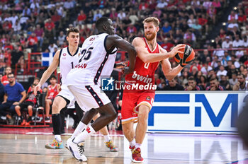 2024-10-15 - 0 Thomas Walkup of Olympiacos Piraeus competing with 25 Ousmane Diop of EA7 Emporio Armani Milan during the Euroleague, Round 3 match between Olympiacos Piraeus and EA7 Emporio Armani Milan at Peace and Friendship Stadium on October 15, 2024, Piraeus, Greece. - OLYMPIACOS VS EA7 EMPORIO ARMANI MILAN - EUROLEAGUE - BASKETBALL