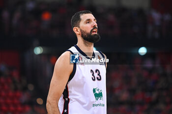 2024-10-15 - 33 Nikola Mirotic of EA7 Emporio Armani Milan is playing during the Euroleague, Round 3 match between Olympiacos Piraeus and EA7 Emporio Armani Milan at Peace and Friendship Stadium on October 15, 2024, Piraeus, Greece. - OLYMPIACOS VS EA7 EMPORIO ARMANI MILAN - EUROLEAGUE - BASKETBALL