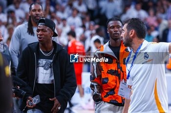 2024-10-24 - 24th October 2024; Wizink Center; Madrid, Spain; Turkish Airlines Euroleague Basketball; Spain, Real Madrid vs Crvena Zvezda; Camavinga and Vinicius players of Real Madrid FootballEuroleague Basketball Real Madrid v Crvena Zvezda 900/Cordon Press - EUROLEAGUE BASKETBALL REAL MADRID V CRVENA ZVEZDA - EUROLEAGUE - BASKETBALL