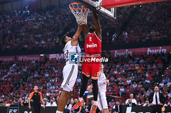 2024-10-29 - 2 Moses Wright of Olympiacos Piraeus competing with 22 Walter Tavares of Real Madrid during the Euroleague, Round 6 match between Olympiacos Piraeus and Real Madrid at Peace and Friendship Stadium on October 29, 2024, Piraeus, Greece. - OLYMPIACOS VS REAL MADRID - EUROLEAGUE - BASKETBALL