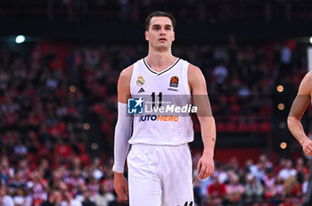 2024-10-29 - 11 Mario Hezonja of Real Madrid is playing during the Euroleague, Round 6 match between Olympiacos Piraeus and Real Madrid at Peace and Friendship Stadium on October 29, 2024, Piraeus, Greece. - OLYMPIACOS VS REAL MADRID - EUROLEAGUE - BASKETBALL