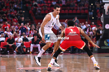 2024-10-29 - 6 Alberto Abalde of Real Madrid competing with 1 Nigel Williams-Goss of Olympiacos Piraeus during the Euroleague, Round 6 match between Olympiacos Piraeus and Real Madrid at Peace and Friendship Stadium on October 29, 2024, Piraeus, Greece. - OLYMPIACOS VS REAL MADRID - EUROLEAGUE - BASKETBALL