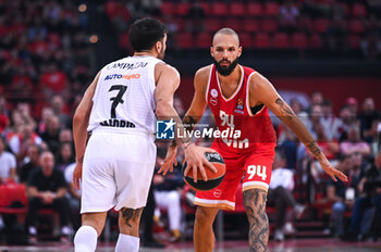 2024-10-29 - 94 Evan Fournier of Olympiacos Piraeus competing with 7 Facundo Campazzo of Real Madrid during the Euroleague, Round 6 match between Olympiacos Piraeus and Real Madrid at Peace and Friendship Stadium on October 29, 2024, Piraeus, Greece. - OLYMPIACOS VS REAL MADRID - EUROLEAGUE - BASKETBALL