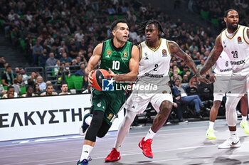 2024-10-30 - 10 Kostas Sloukas of Panathinaikos AKTOR Athens competing with 2 Admiral Schofield of LDLC ASVEL Villeurbanne during the Euroleague, Round 6 match between Panathinaikos AKTOR Athens and LDLC ASVEL Villeurbanne at OAKA Altion Arena on October 30, 2024, Athens, Greece. - PANATHINAIKOS VS LDLC ASVEL VILLEURBANNE - EUROLEAGUE - BASKETBALL